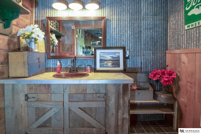 bathroom with tile patterned floors and sink