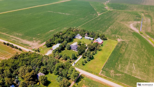 birds eye view of property with a rural view
