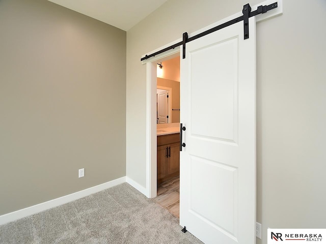 interior space featuring a barn door