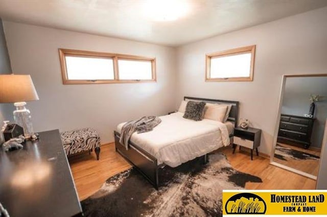 bedroom featuring light wood-type flooring