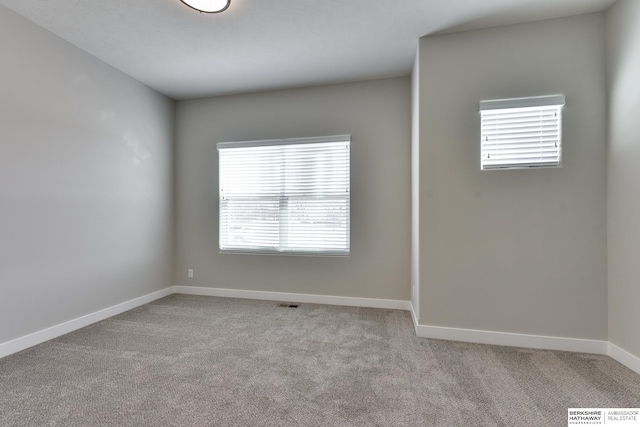 view of carpeted spare room