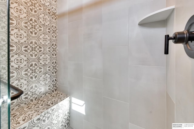 bathroom featuring walk in shower