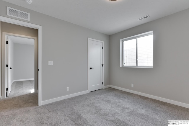 view of carpeted spare room