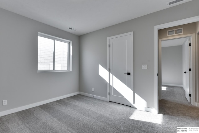 unfurnished bedroom featuring carpet