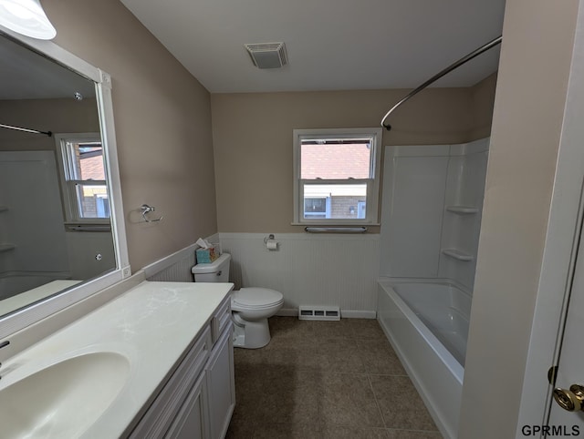 full bathroom with tile patterned flooring, vanity, tub / shower combination, and toilet