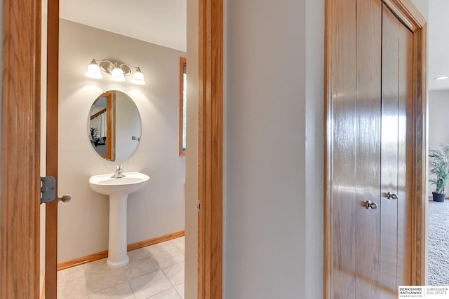 bathroom with tile patterned flooring