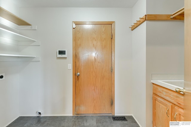 clothes washing area featuring electric dryer hookup