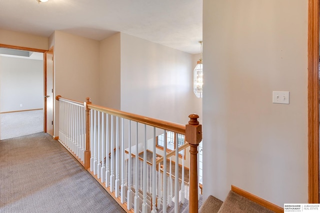 corridor featuring carpet flooring