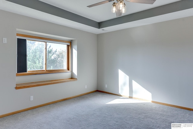 carpeted empty room with ceiling fan