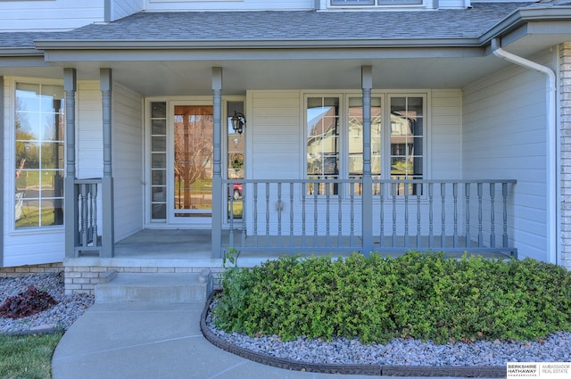 property entrance featuring a porch