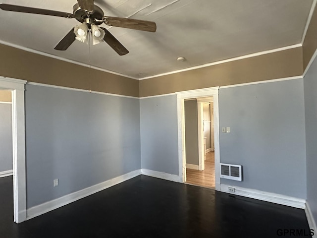 1424 4th Ave, Scottsbluff, NE 69361 - spare room featuring ceiling fan and wood-type flooring