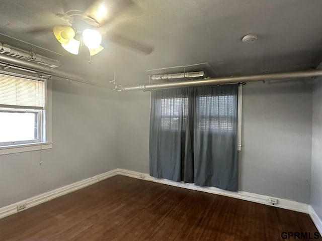 1424 4th Ave, Scottsbluff, NE 69361 - unfurnished room featuring wood-type flooring