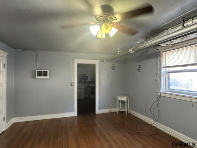 1424 4th Ave, Scottsbluff, NE 69361 - empty room featuring dark wood-type flooring