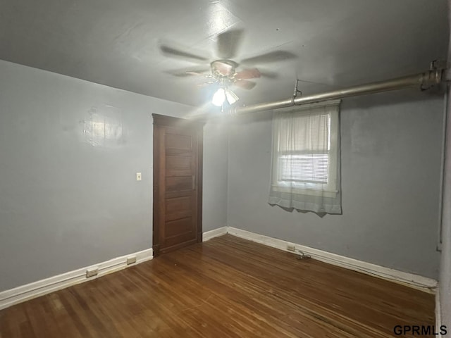 1424 4th Ave, Scottsbluff, NE 69361 - empty room with ceiling fan and dark hardwood / wood-style floors