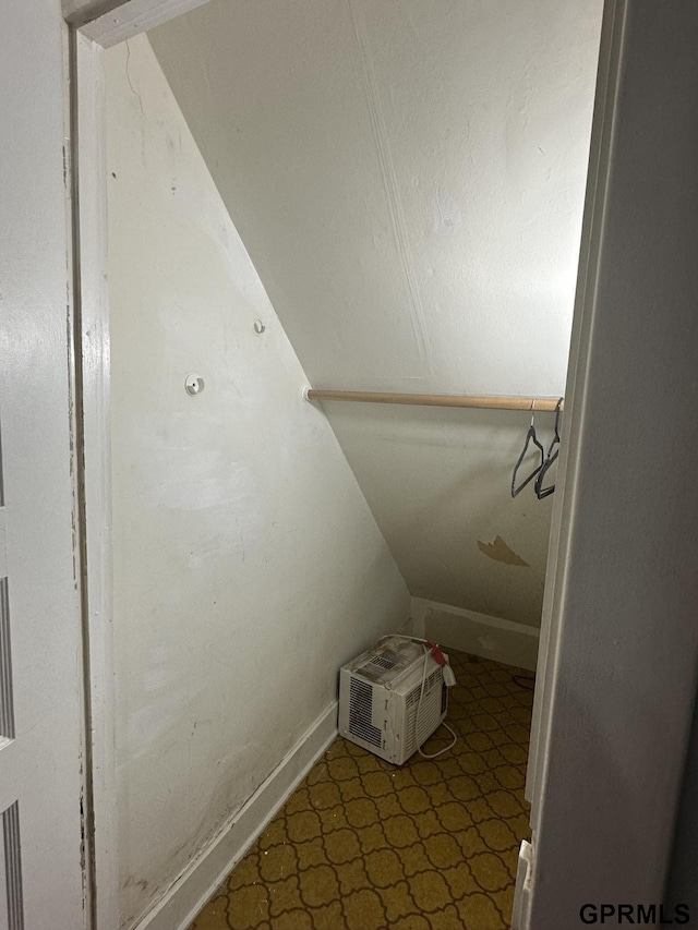 1424 4th Ave, Scottsbluff, NE 69361 - stairs with a wall mounted air conditioner and vaulted ceiling