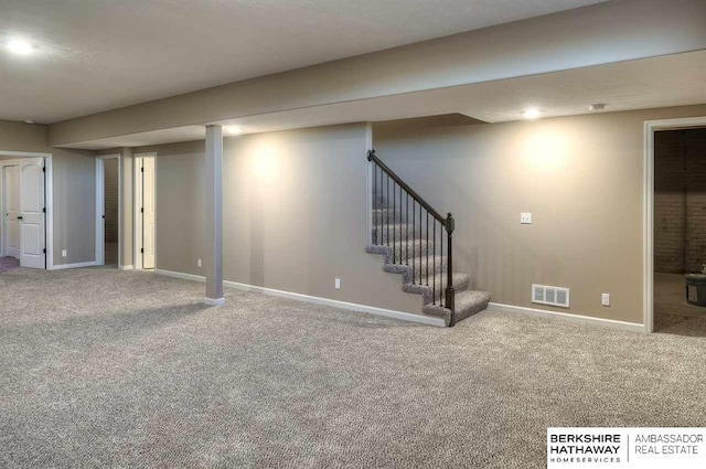 basement featuring carpet floors