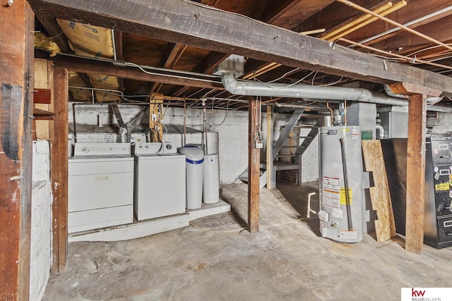 basement with gas water heater, washing machine and dryer, and heating unit