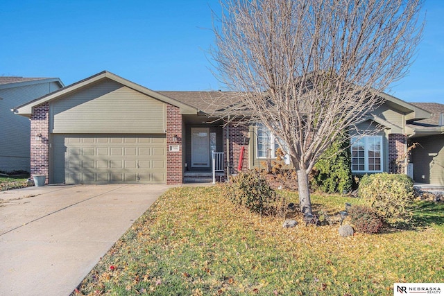 ranch-style home with a front lawn and a garage