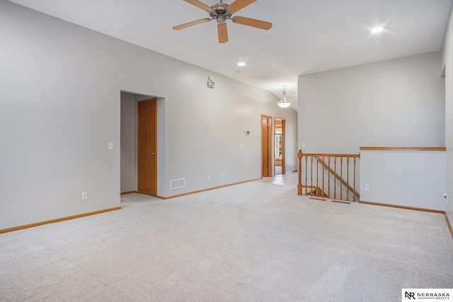 carpeted empty room featuring ceiling fan