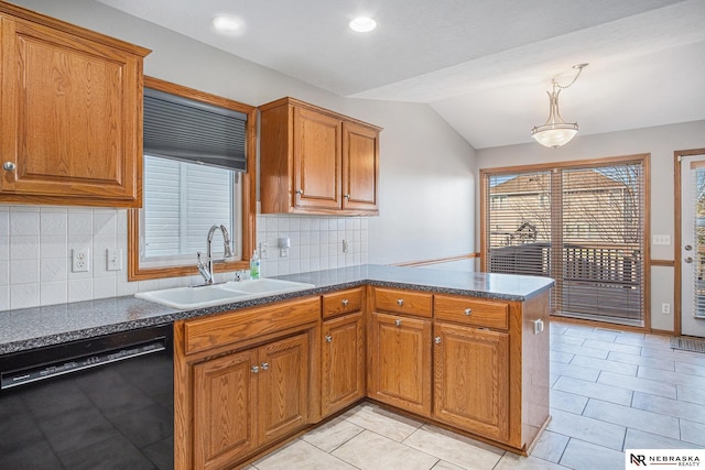 kitchen featuring sink, black dishwasher, lofted ceiling, decorative backsplash, and light tile patterned flooring