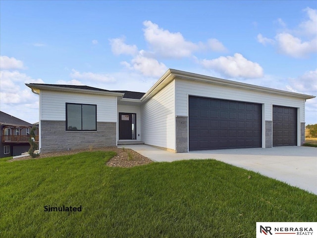 view of front facade with a garage and a front lawn