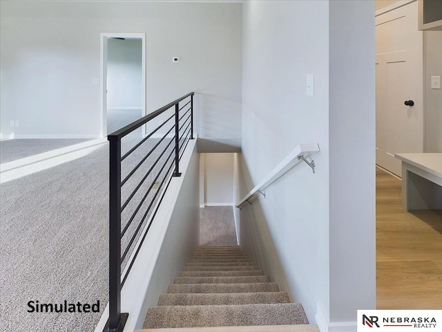 stairs with hardwood / wood-style floors