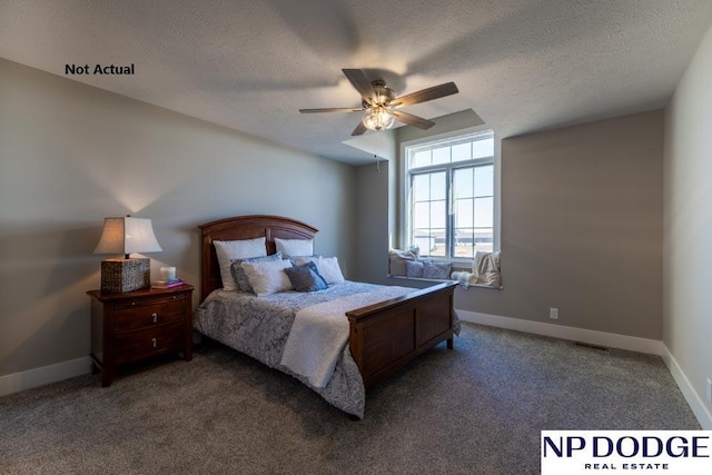 bedroom with dark colored carpet, ceiling fan, and a textured ceiling