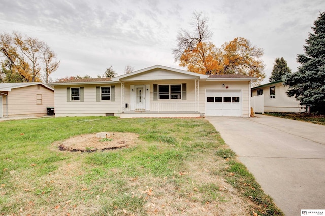 single story home with a front lawn, a porch, and a garage