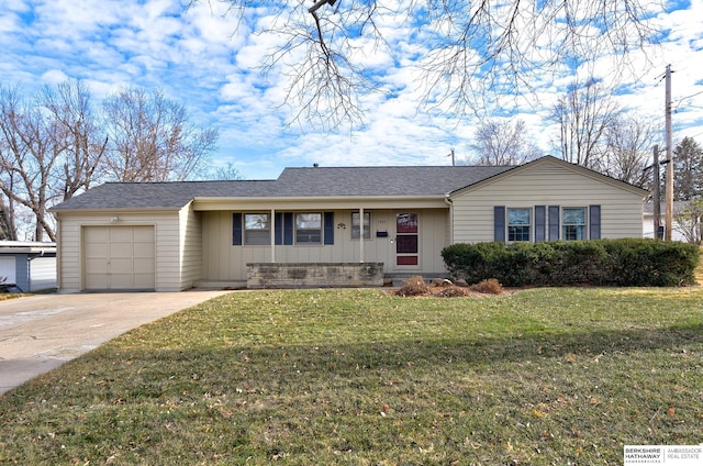 ranch-style house with a front yard and a garage