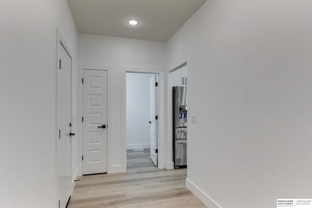 hallway featuring light wood-type flooring