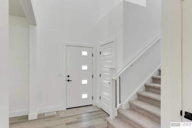 entrance foyer featuring light hardwood / wood-style floors