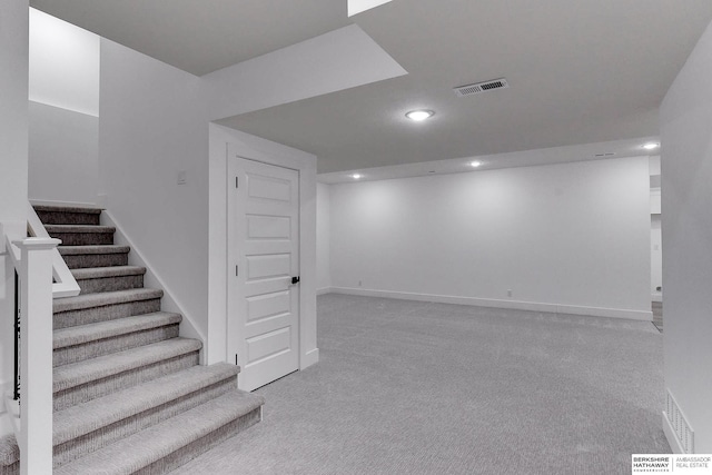 basement with light carpet