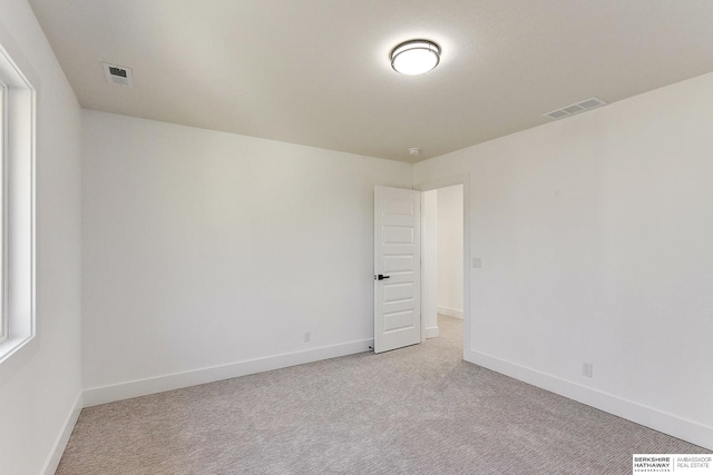 view of carpeted spare room