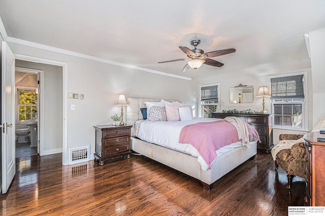 bedroom with ceiling fan, crown molding, and dark wood-type flooring