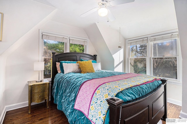 bedroom featuring ceiling fan, dark hardwood / wood-style floors, and vaulted ceiling