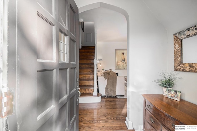 hall featuring dark wood-type flooring