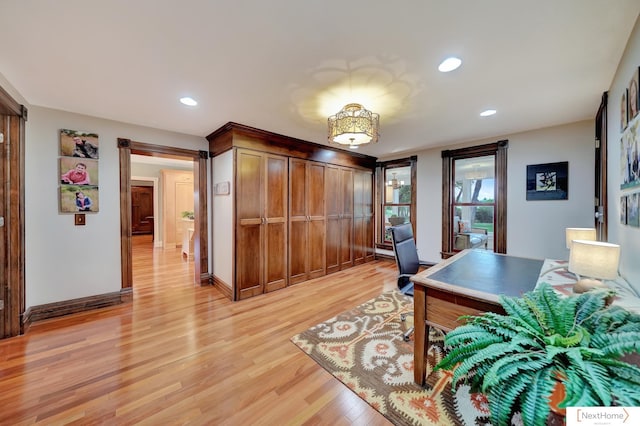 home office featuring light hardwood / wood-style floors