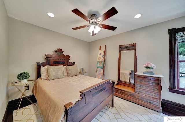 bedroom featuring ceiling fan and light wood-type flooring