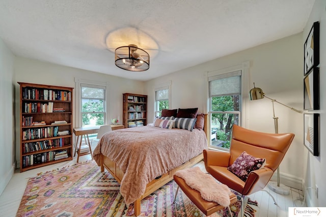 bedroom featuring a textured ceiling