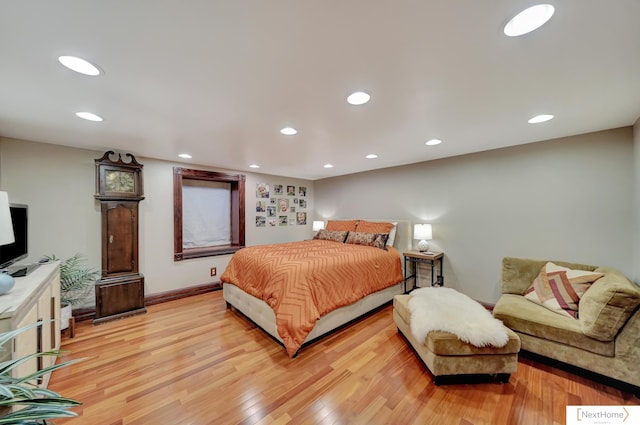 bedroom with light hardwood / wood-style flooring