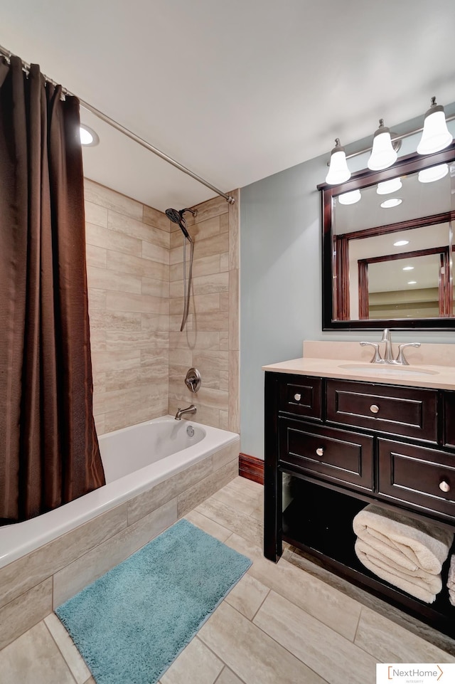 bathroom featuring shower / tub combo with curtain and vanity