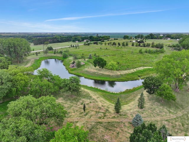 bird's eye view featuring a rural view and a water view