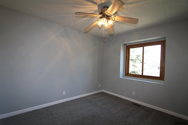 carpeted empty room with ceiling fan