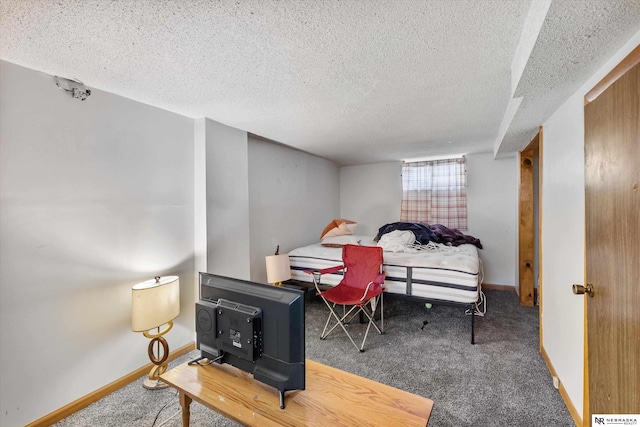 carpeted bedroom with a textured ceiling