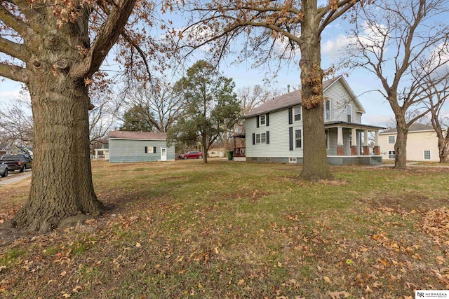 view of yard featuring a porch