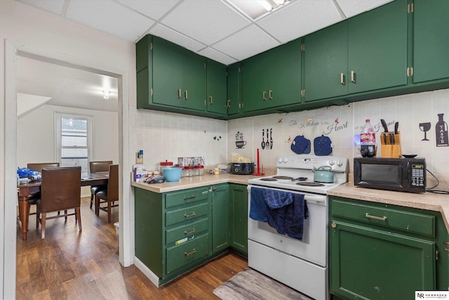 kitchen featuring dark hardwood / wood-style flooring, a drop ceiling, white range with electric stovetop, and green cabinetry