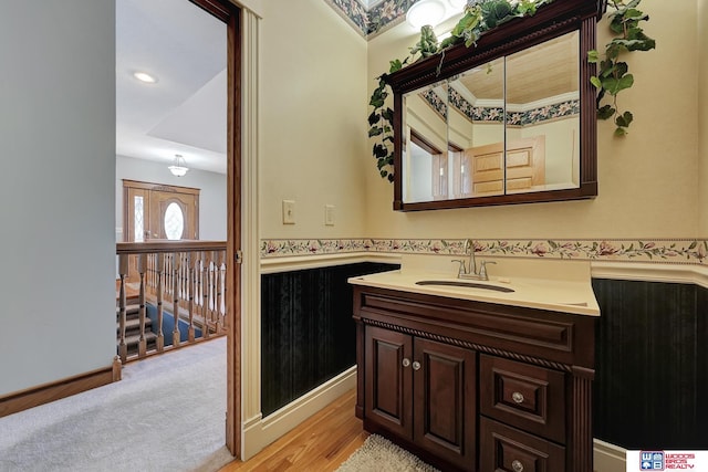 bathroom featuring vanity and hardwood / wood-style flooring