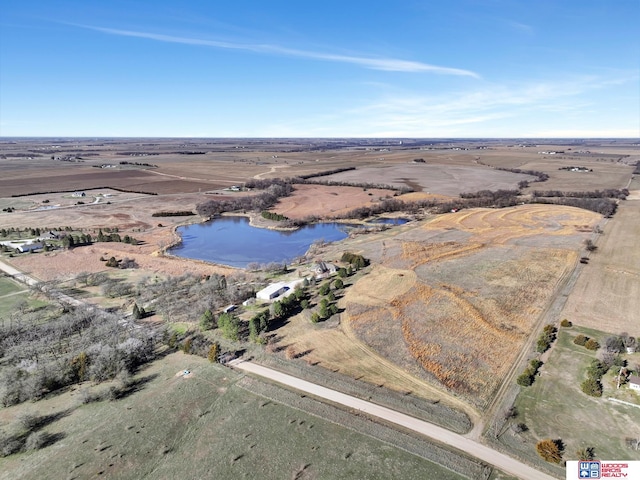 bird's eye view featuring a water view and a rural view