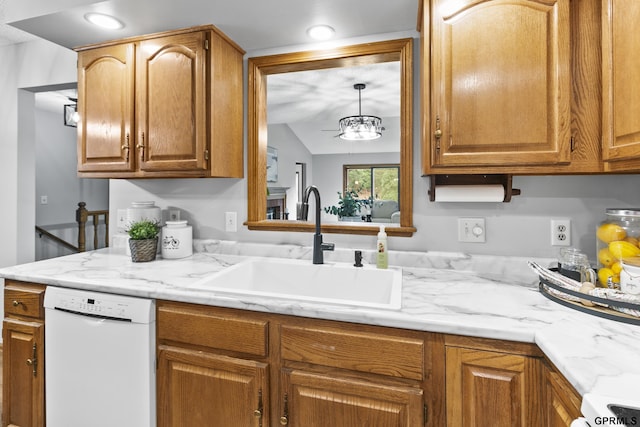 kitchen featuring sink, white dishwasher, lofted ceiling, and a notable chandelier