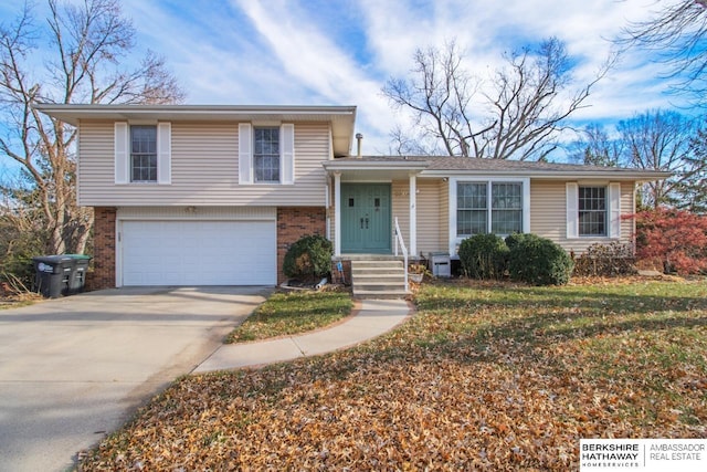 split level home with a garage